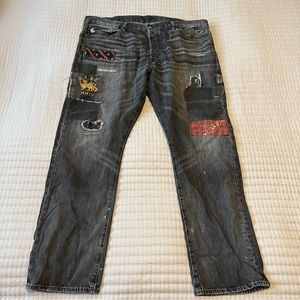 Men's Distressed Patchwork Jeans - Black with Red Accents